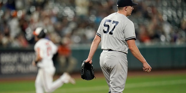 Baltimore Orioles' Austin Hays shouts toward his dugout as he runs after hitting a two-run home run off New York Yankees relief pitcher Chad Green during the eighth inning of a baseball game, Woensdag, Sept.. 15, 2021, in Baltimore.