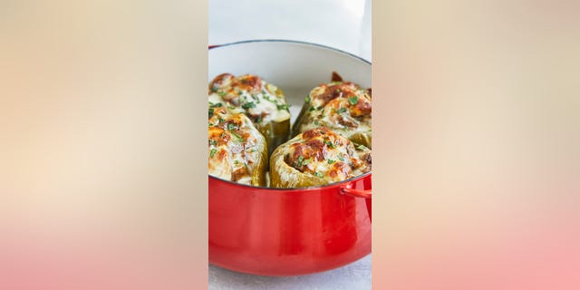 The Cheesesteak-Stuffed Peppers with Wild Rice from Cassy Joy Garcia’s new cookbook "Cook Once Dinner Fix: Quick and Exciting Ways to Transform Tonight's Dinner into Tomorrow's Feast" is pictured.
