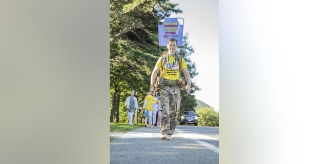 British Army Army Major Chris Brannigan, 41, began his Barefoot March on Aug. 31, 2021, in Maine. He plans to walk to North Carolina in 53 days as he works to raise awareness and funding for Cornelia de Lange Syndrome research.