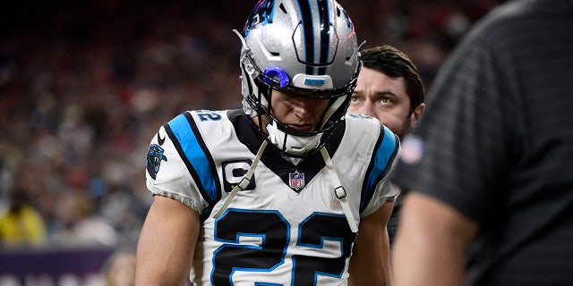 Carolina Panthers running back Christian McCaffrey leaves the field during the first half of a game against the Houston Texans Thursday, Sept. 23, 2021, in Houston.