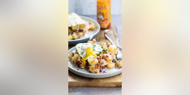 Hill recommends enjoyed corned beef hash topped with an egg with a runny yolk. 