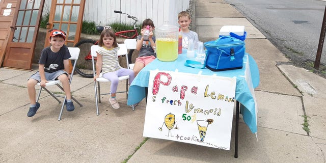 8-year-old Andrew Dembeck raised $ 200 at his summer lemonade stand to help his local fire department get a new fire truck. Andrew (far right) is pictured with his siblings at the stand.