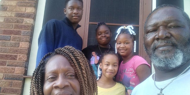 Karen and Tobias Thompson, both 55, from Cincinnati, Ohio, adopted 14-year-olds Wilnya and William and 9-year-olds Shania and Sharleathea last week. 