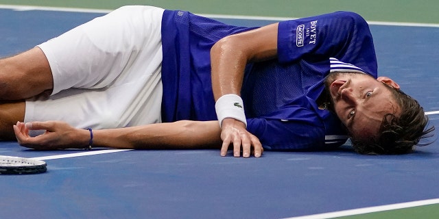 Daniil Medvedev, of Russia, reacts after defeating Novak Djokovic, of Serbia, in the men's singles final of the US Open tennis championships, Sunday, Sept. 12, 2021, in New York. (AP Photo/Elise Amendola)