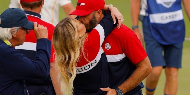 Team USA's Dustin Johnson kisses Paulina Gretzky after Team USA's Ryder Cup win 