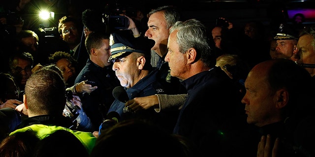 Then-Boston Police Commissioner Edward Davis speaks during a media briefing in the parking lot of the Watertown Mall on April 19, 2013 in Watertown, Massachusetts. (Jared Wickerham/Getty Images)