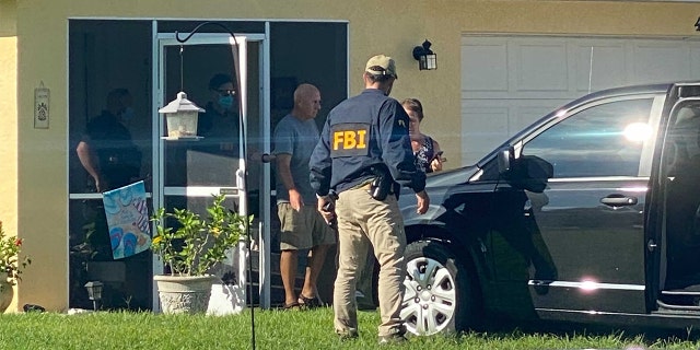 Christopher and Roberta Laundrie exit their home as FBI agents execute a search warrant at their Florida home, Monday, Sept. 20, 2021. (Photo: Paul Best/Fox News)