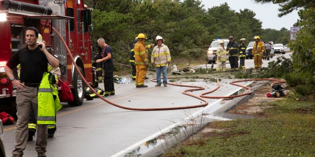 Firefighters at the scene of the crash