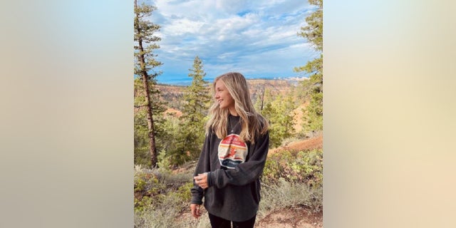 Gabby Petito poses for a photo at Bryce Canyon.