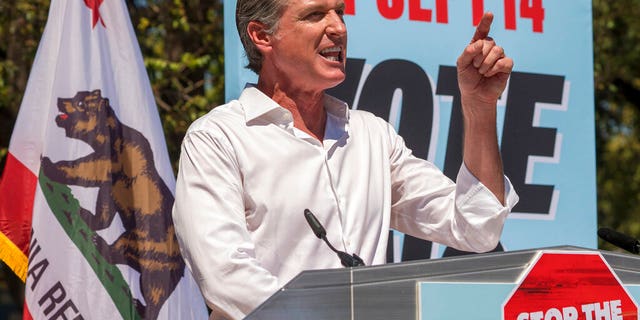 California Democratic Gov. Gavin Newsom campaigns against the California recall election at the Culver City High School in Culver City, Calif., Saturday, Sept. 4, 2021. Newsom enlisted progressive star Sen. Elizabeth Warren, D-Mass., on Saturday to help him overcome a looming recall election that could remove him from office. (AP Photo/Damian Dovarganes)