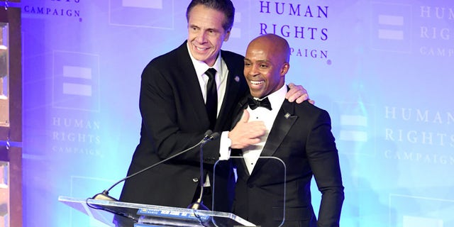 Former New York Gov. Andrew Cuomo is welcomed to the stage by former HRC President Alphonso David during the Human Rights Campaign's 19th Annual Greater New York Gala at the Marriott Marquis Hotel on Feb. 1, 2020, in New York City.