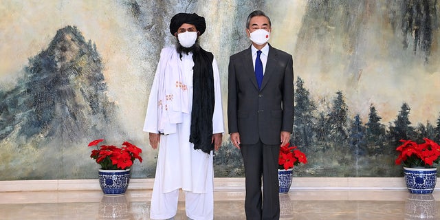 Chinese State Councilor and Foreign Minister Wang Yi meets with Mullah Abdul Ghani Baradar, political chief of Afghanistan's Taliban, in north China's Tianjin, July 28, 2021.
