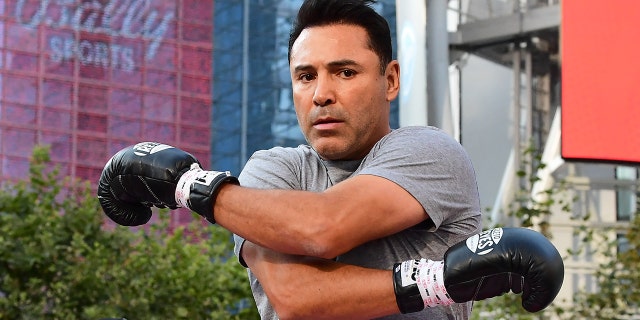 Former US Olympics Gold medalist professional boxer Oscar De La Hoya stretches before sparring with his partner during a media workout in Los Angeles, California on August 24, 2021. (Photo by Frederic J. BROWN / AFP) (Photo by FREDERIC J. BROWN/AFP via Getty Images)
