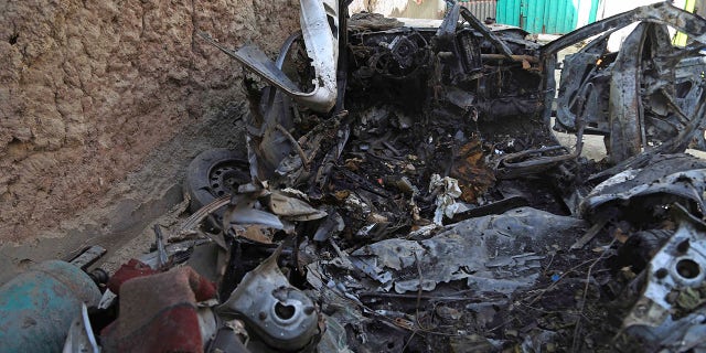 Photo taken on Sept. 2, 2021 shows damaged vehicles at the site of the U.S. airstrike in Kabul, capital of Afghanistan. TO GO WITH: "Feature: Neighbor, relative of drone strike victims lambaste U.S. killing in Afghanistan.