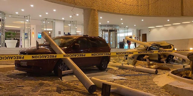 View of damaged cars outside a hotel after a quake in Acapulco, Guerrero state, Mexico on September 7, 2021. (Photo by FRANCISCO ROBLES/AFP via Getty Images)