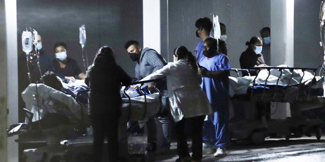 Medical staff move patients out of a hospital after an earthquake in Mexico City, capital of Mexico, on Sept. 7, 2021. (Photo by Sunny Quintero/Xinhua via Getty Images)