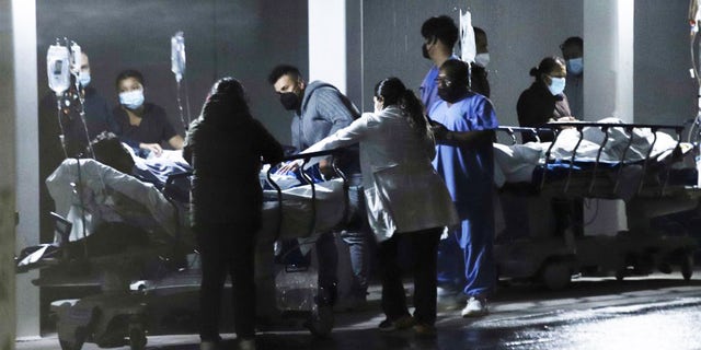Medical staff move patients out of a hospital after an earthquake in Mexico City, capital of Mexico, on Sept. 7, 2021. (Photo by Sunny Quintero/Xinhua via Getty Images)