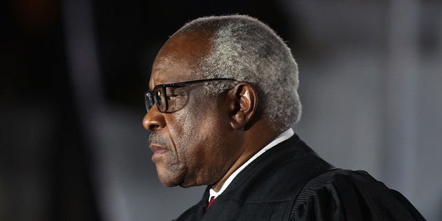 Associate Justice of the Supreme Court Clarence Thomas attends Amy Coney Barrett's swearing-in ceremony as Associate Justice of the Supreme Court of the United States on the South Lawn of the White House on October 26, 2020 in Washington, DC .  Barrett will hear his first case in person as a Supreme Court judge on Monday, while Thomas will be closely watched for how he handles questioning.  (Photo by Tasos Katopodis / Getty Images)