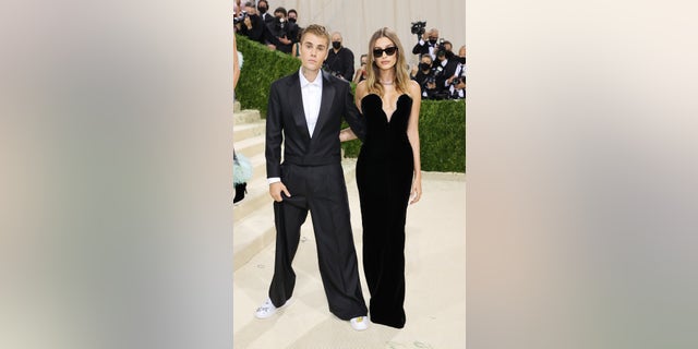 Justin Beiber and Hailey Bieber have both had health scares this year after she suffered "stroke-like" symptoms and required heart surgery. Pictured at the Met Gala in September.