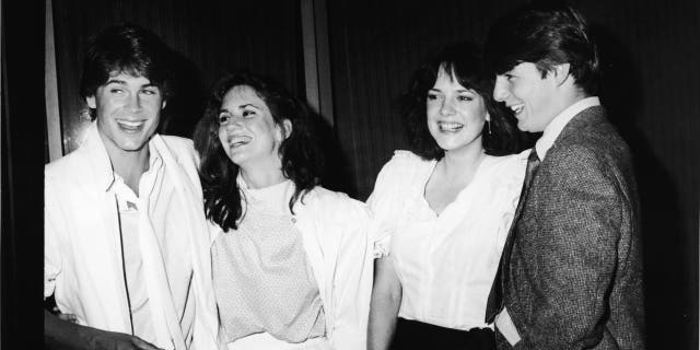 L-R: Actors Rob Lowe, Melissa Gilbert, Michelle Meyrink, and Tom Cruise smile while attending a screening of the film 'In The Custody of Strangers' at the Samuel Goldwyn Theatre, Beverly Hills, California, April 22, 1982.