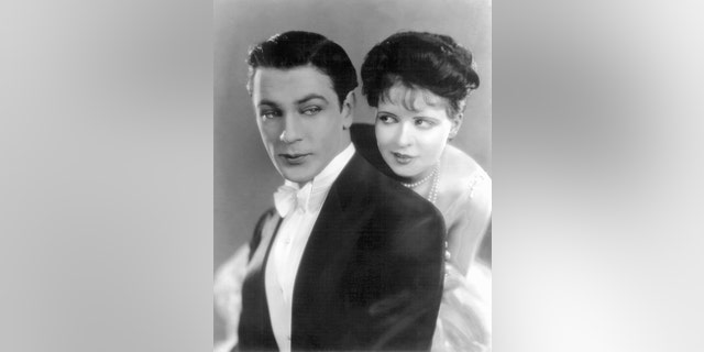 American actors Gary Cooper and Clara Bow on the set of "Children of Divorce," based on the novel by Owen Johnson and directed by Frank Lloyd. 