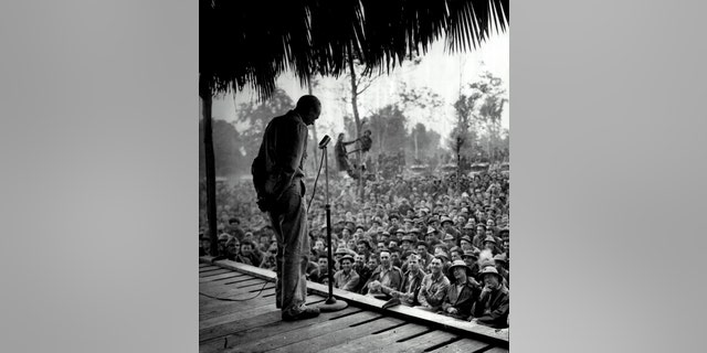 Actor Gary Cooper thrills Marines at a Southwest Pacific base by repeating the famous farewell speech he gave as Lou Gehrig in the movie "Pride of the Yankees." Cooper headed a camp show, which toured the Pacific islands, circa 1942. 
