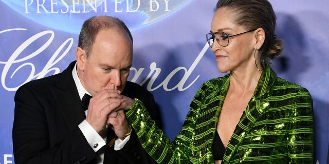 HSH Prince Albert II of Monaco (L) and Sharon Stone arrive at the 2020 Hollywood For The Global Ocean Gala Honoring HSH Prince Albert II Of Monaco at Palazzo di Amore on February 06, 2020 in Beverly Hills, California. 