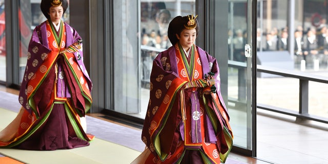 Japan's Princess Mako (R) attends the enthronement ceremony where Emperor Naruhito officially proclaimed his ascension to the Chrysanthemum Throne at the Imperial Palace on Oct. 22, 2019 in Tokyo, Japan. 