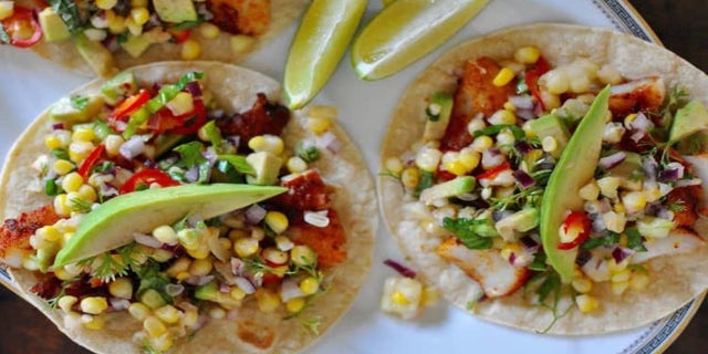 Grill fish tacos with sweet corn salsa.