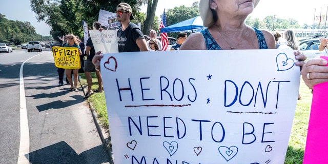 Hauppauge, N.Y.: Health care workers protest against being forced to get the Covid-19 vaccine, outside the New York State Office Building in Hauppauge, New York on Long Island on Aug. 27, 2021. (Photo by Alejandra Villa Loraca/Newsday RM via Getty Images)