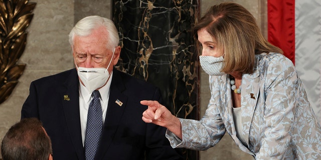 U.S. House Majority Leader Steny Hoyer (D-MD) and Speaker of the House Nancy Pelosi (D-CA) wait during votes at the first session of the 117th Congress in the House Chamber at the U.S. Capitol in Washington, DC, Jan. 3, 2021.