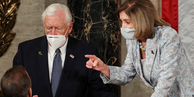 U.S. House Majority Leader Steny Hoyer (D-MD) and Speaker of the House Nancy Pelosi (D-CA) wait during votes at the first session of the 117th Congress in the House Chamber at the U.S. Capitol in Washington, DC, Jan. 3, 2021.