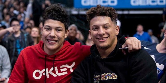 Kansas City Chiefs quarterback Patrick Mahomes (right) watches a game between the Dallas Mavericks and Houston Rockets with brother Jackson Mahomes at the American Airlines Center March 10, 2019.