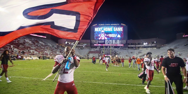 Jacksonville State wide receiver Michael Pettway (2) waves a flag on the field after the team's 20-17 win over Florida State in an NCAA college football game Saturday, Sept. 11, 2021, in Tallahassee, Fla. (AP Photo/Phil Sears)