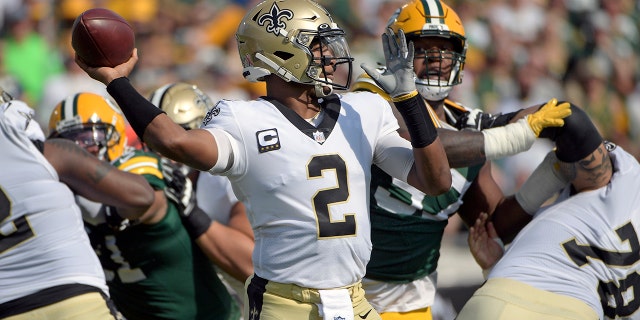 New Orleans Saints quarterback Jameis Winston (2) throws a pass during the first half of an NFL football game against the Green Bay Packers, Sunday, Sept. 12, 2021, in Jacksonville, Fla. (AP Photo/Phelan M. Ebenhack)