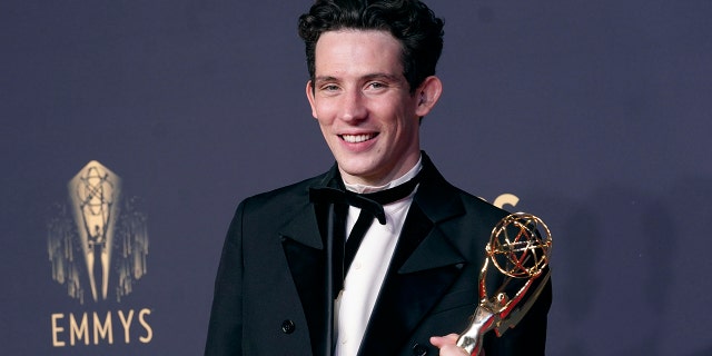 Josh O'Connor, winner of the award for outstanding lead actor in a drama series for "The Crown" poses at the 73rd Primetime Emmy Awards on Sunday, Sept. 19, 2021, at L.A. Live in Los Angeles.