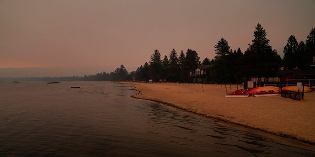 An empty beach is seen on Tuesday, Aug. 31 after a mandatory evacuation was ordered due to the Caldor Fire in South Lake Tahoe, Calif. 