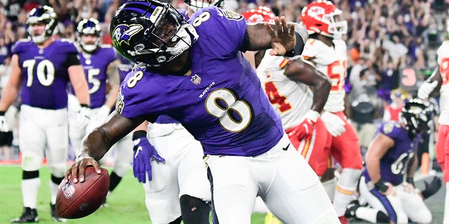 Baltimore Ravens quarterback Lamar Jackson (8) celebrates a fourth quarter touchdown against the Kansas City Chiefs at M&T Bank Stadium.