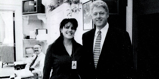 A photograph showing former White House intern Monica Lewinsky meeting President Bill Clinton at a White House function submitted as evidence in documents by the Starr investigation and released by the House Judicary committee on September 21, 1998.