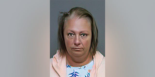 Lori Desjardins, 45, is accused of assaulting and berating a Navy sailor inside a Connecticut pizza shop.