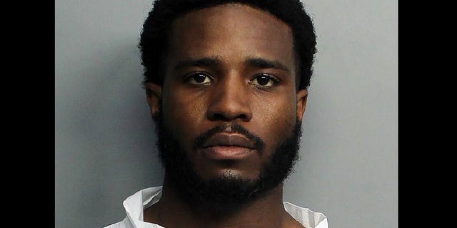 This image provided by the Miami-Dade Police Department shows Tamarius Blair Davis Jr., who fatally shot a tourist eating dinner with his family at a Miami Beach restaurant, police and a family member said. (Miami-Dade Police Department via AP)