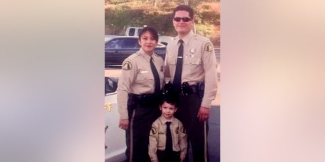 Marine Corps Cpl. Hunter Lopez, who was killed in Afghanistan last month, as a young boy with his parents Herman and Alicia Lopez.