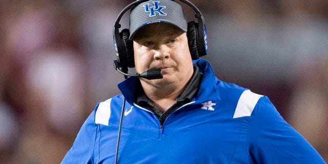 Kentucky head coach Mark Stoops looks on in the first half of an NCAA college football game against South Carolina, Saturday, Sept. 25, 2021, at Williams-Brice Stadium in Columbia, S.C.