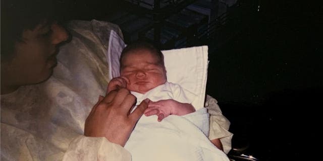 Melanie Pressley's sister Lee Ann Dewey asked a nurse if she could hold Greg Vossler a day after he was born in 1988. She snapped a picture of him that day and it was all Pressley was left with for 33 years.