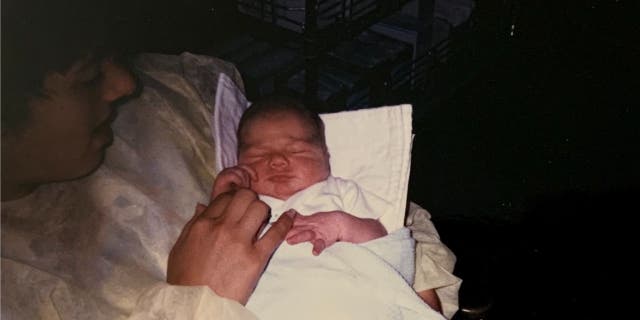 Melanie Pressley's sister Lee Ann Dewey asked a nurse if she could hold Greg Vossler a day after he was born in 1988. She snapped a picture of him that day and it was all Pressley was left with for 33 years.