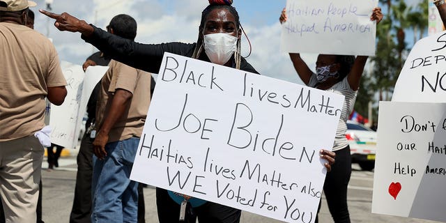 Protesters demonstrate outside a U.S. Citizenship and Immigration Services (USCIS) building in Miami to denounce the expulsion of Haitian refugees from Del Rio, Texas, Sept. 22, 2021. (Getty Images)