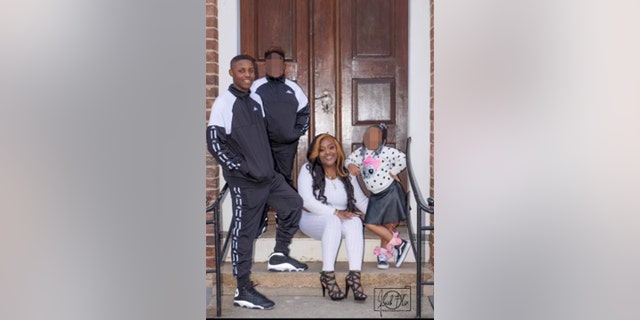 William Chavis Raynard Miller Jr. (far left) and his mother Shannon Clark. The teen was killed in a shooting at Mount Tabor High School in Winston-Salem.