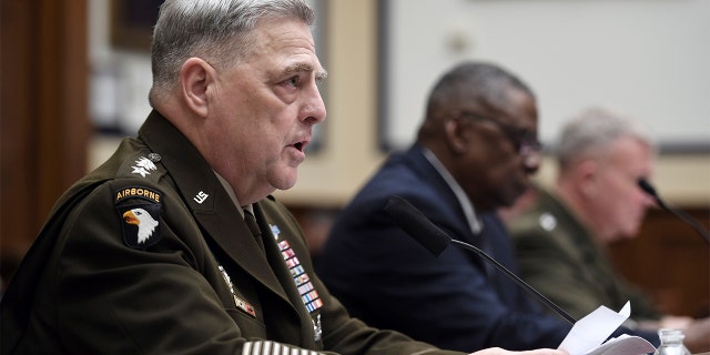 Gen. Mark Milley, chairman of the Joint Chiefs of Staff, testifies before the House Armed Services Committee on the conclusion of military operations in Afghanistan, Wednesday, Sept. 29, 2021, on Capitol Hill in Washington. (Olivier Douliery/Pool via AP)