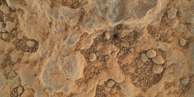 Perseverance took this close-up of a rock target nicknamed "Foux" using its WATSON camera on July 11, 2021, the 139th Martian day, or sol, of the mission. The area within the camera is roughly 1.4 by 1 inches (3.5 centimeters by 2.6 centimeters).