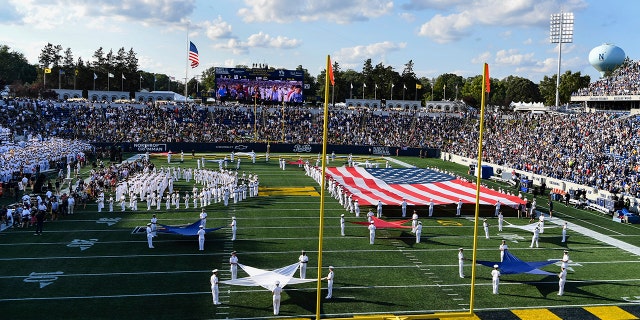 Navy's marching band performs at halftime during an NCAA college football game between Navy and Air Force, Saturday, Sept. 11, 2021, in Annapolis, Md. (AP Photo/Terrance Williams)